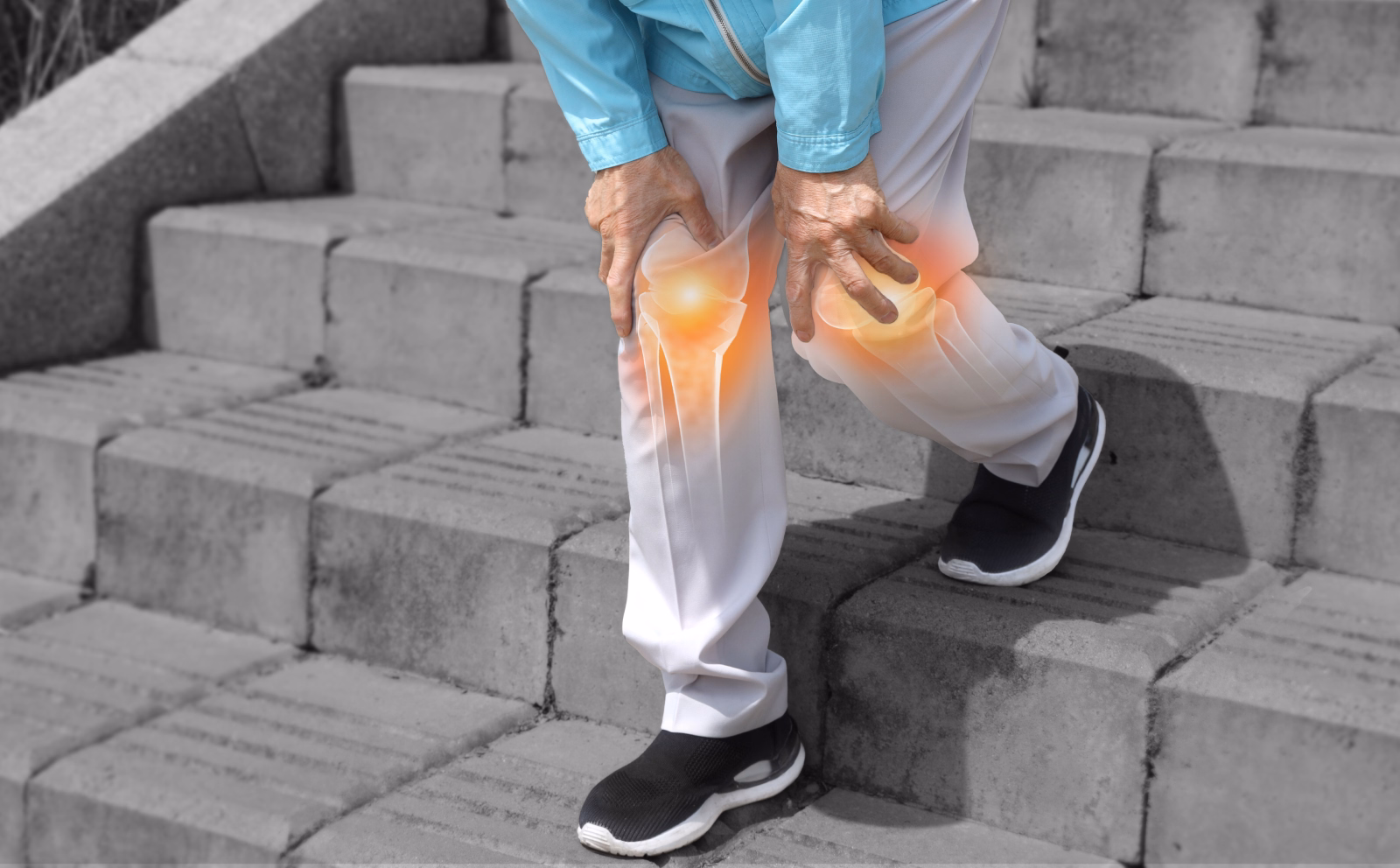 An older person on concrete stairs gripping both knees, with glowing pain highlighted on each knee joint.